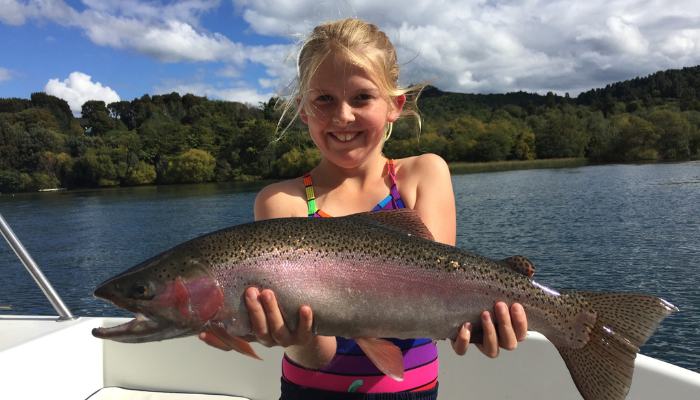 Head to Rotorua if you’re angling for an amazing family fishing adventure